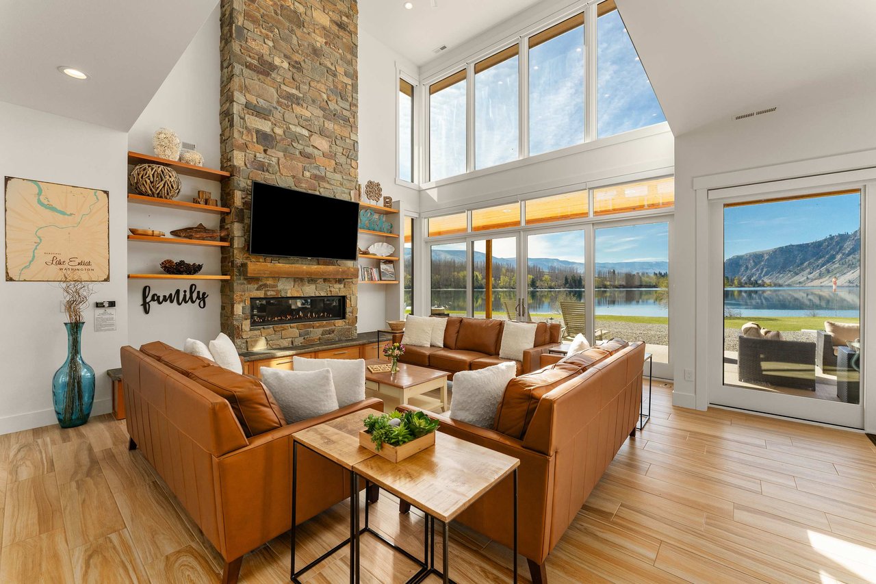 Interior of a modern living room with lake view