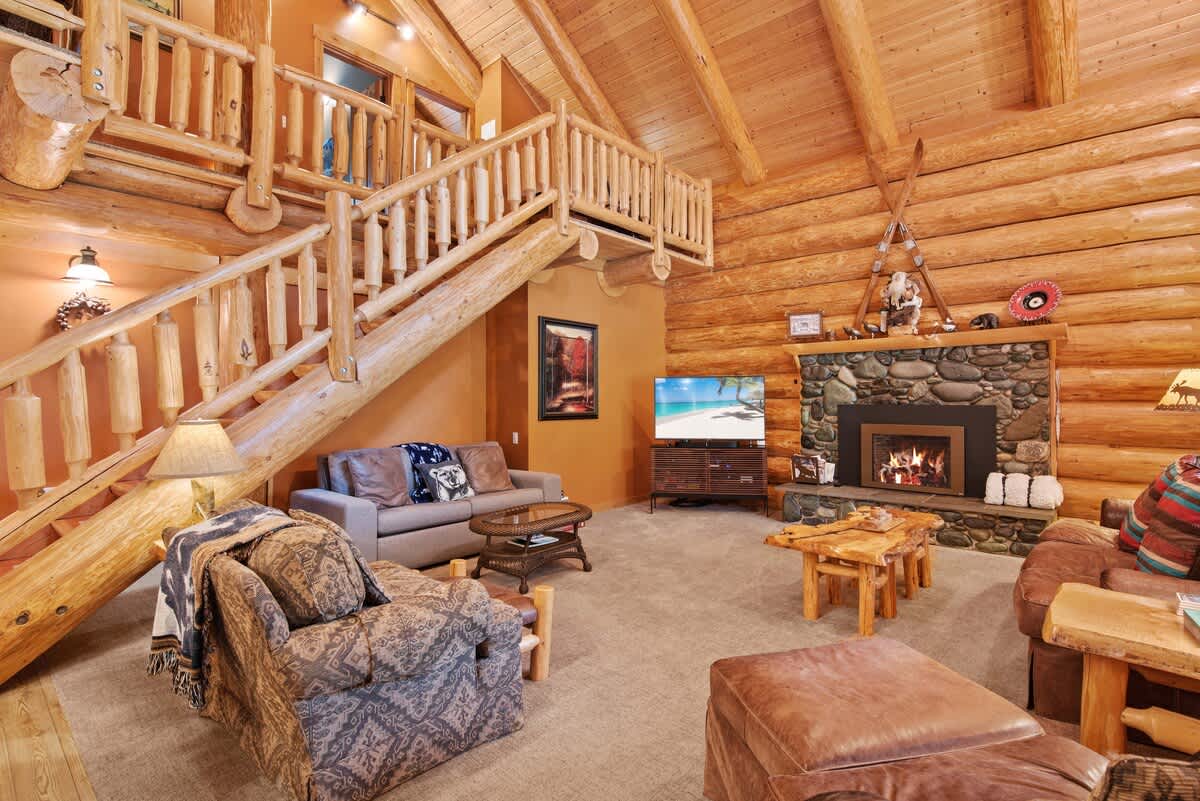 Living room with stairs to the loft