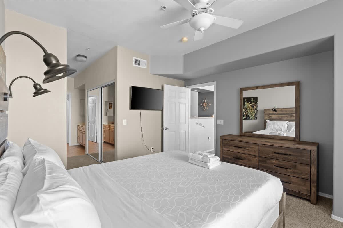 Bedroom with Dresser and Television