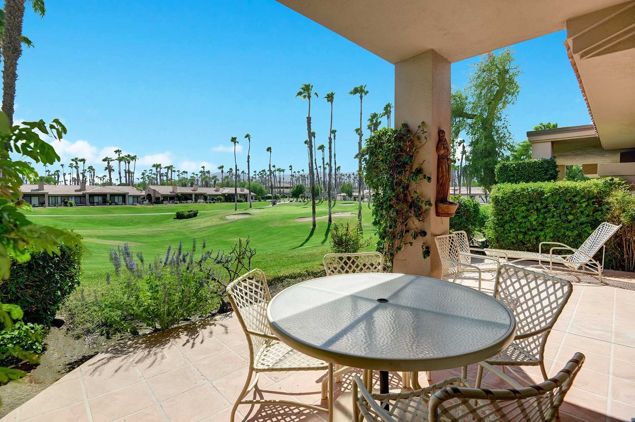Step out onto your covered patio and soak in sweeping views of lush fairways, swaying palms, and endless blue skies—your perfect spot for morning coffee or evening conversation.
