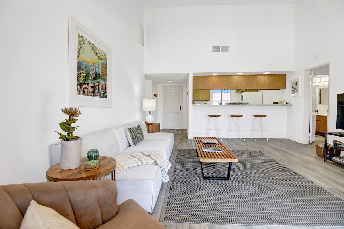Stretch out on the sofa and feel the bright, airy space invite you to unwind. The open kitchen with bar seating makes mornings easy and evenings warm.