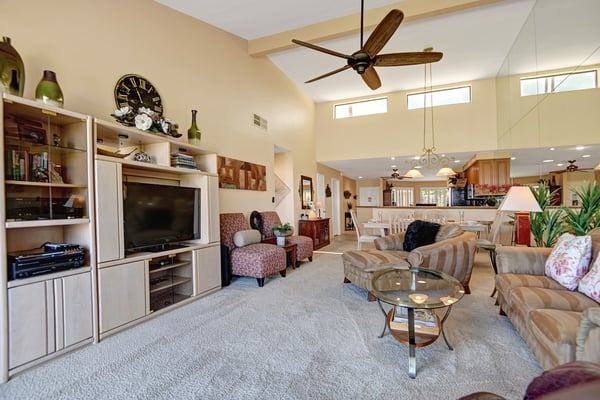 Relax in your spacious, light-filled living area with soaring ceilings and breezy island vibes. Unwind on plush seating, enjoy entertainment on the big screen, or wander into the open kitchen where your vacation unfolds effortlessly.