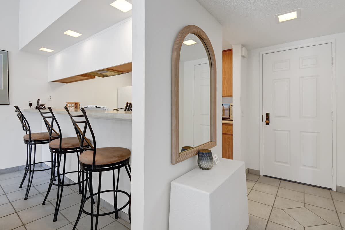 KITCHEN BAR TOP AND ENTRY WAY