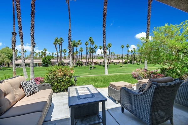 Settle into your private patio oasis and take in the stunning golf course views framed by swaying palms. Lush gardens surround you, making this the perfect spot to sip your morning coffee or unwind at sunset.