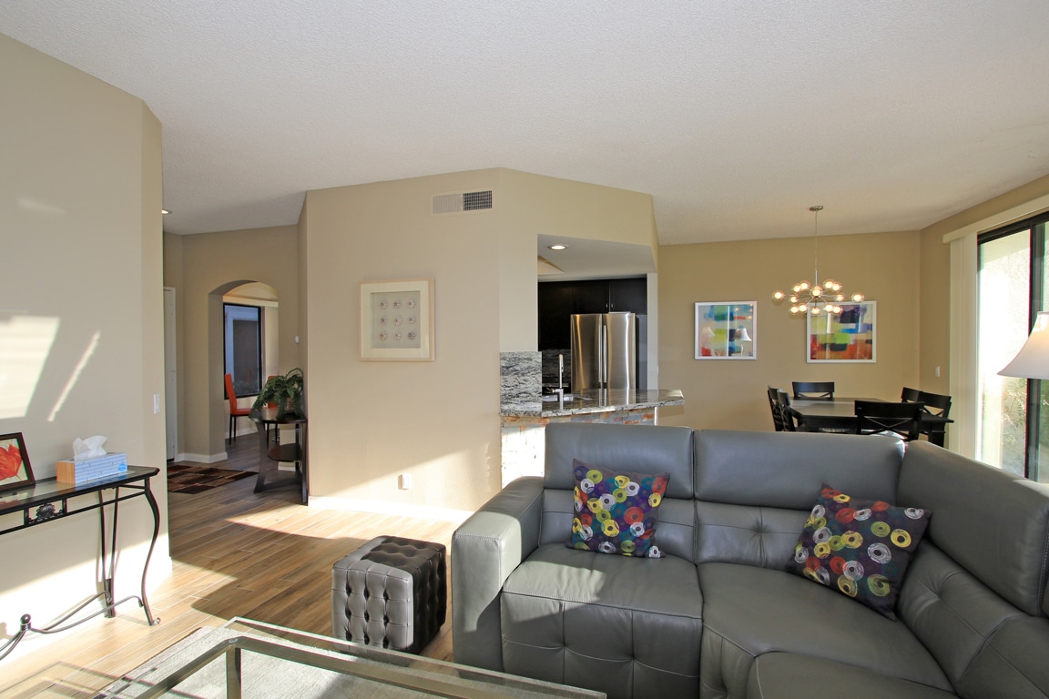 Sink into the modern sectional and enjoy the open-concept design connecting your living, dining, and kitchen spaces—perfect for gathering with loved ones or unwinding after exploring the area.