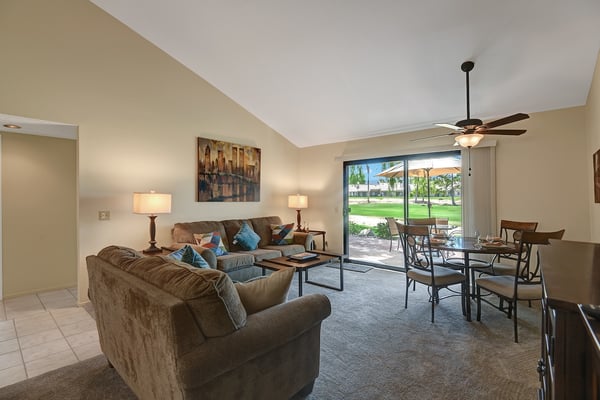 Step into your bright and welcoming retreat where plush seating invites you to unwind while sliding glass doors open to your private patio and golf course views.