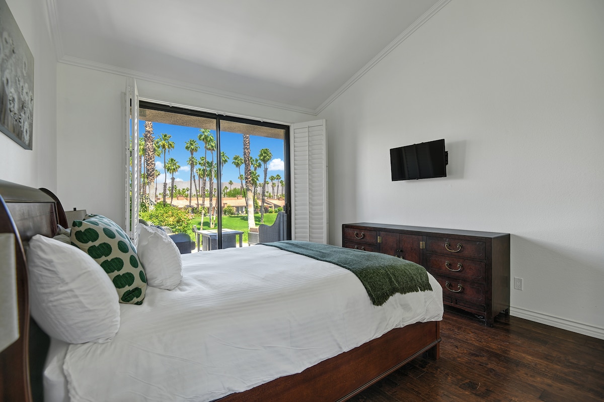 Wake up to swaying palm trees and bright blue skies framed by your private balcony door. Crisp linens and a serene garden view make this your peaceful retreat.