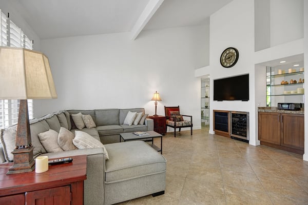 Sink into plush seating and unwind in your bright, airy living space. With soaring ceilings and plenty of room to stretch out, you'll find everything you need to relax and feel at home.