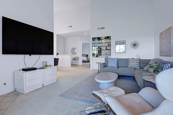 Sink into the plush sofa and unwind in this bright, open living space—your perfect retreat after exploring the area. Modern comforts and stylish details make you feel right at home.