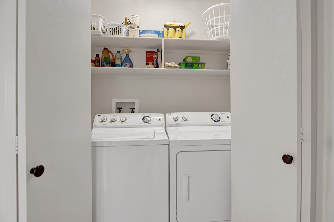 Your own in-unit washer and dryer means you can pack light and keep your wardrobe fresh throughout your stay, with shelving above stocked with essentials.